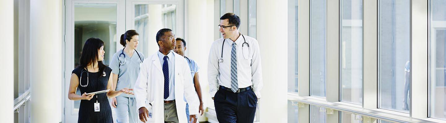 group of providers walking down hallway