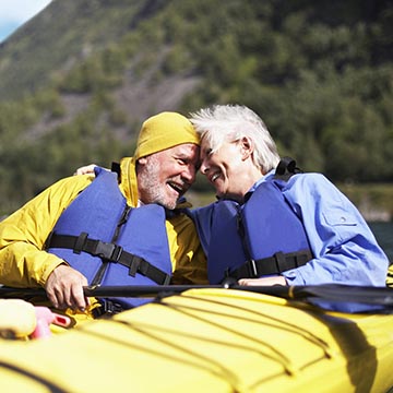 senior couple kayaking 